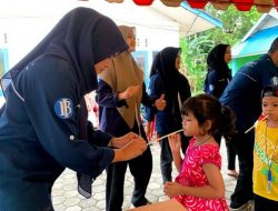 Pengabdian Masyarakat bersama GenBI UMRAH di Kampung Tanjung Kapur