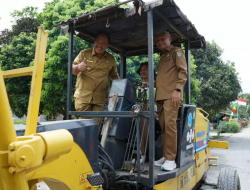 Bupati Asahan Letakkan Batu Pertama Pembangunan Jalan Penghubung 2 Desa di Kecamatan Bandar Pulau
