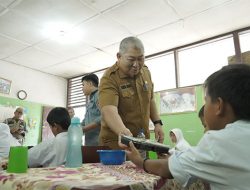 Sekda Asahan Launching Gerakan Serentak Uji Coba Makanan Gratis Bagi Peserta Didik