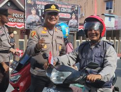 Semarak HUT- RI ke-80, Kepolisian Resor Kota Tanjungpinang Berbagi Bendera Merah Putih